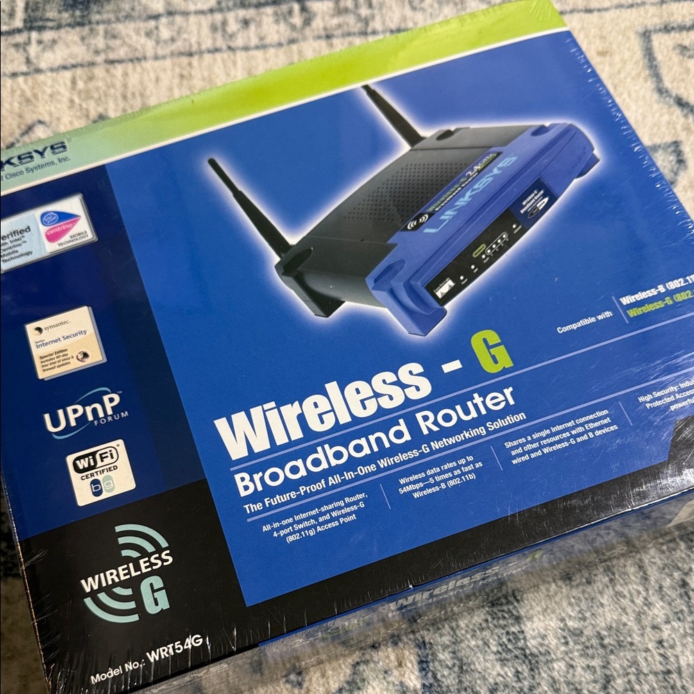 Linksys Blue and Black Wireless-G Broadband Router. NWOT